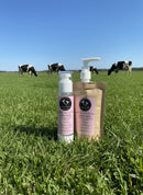 Refill: Korean Milk Water Moisturizer next to cows in a field, showcasing eco-friendly packaging and moisture-rich formula.