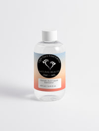 Glycolic Acid Liquid Exfoliator from Eight Bare Feet, featuring a bottle of exfoliating serum designed to smooth and brighten the skin.